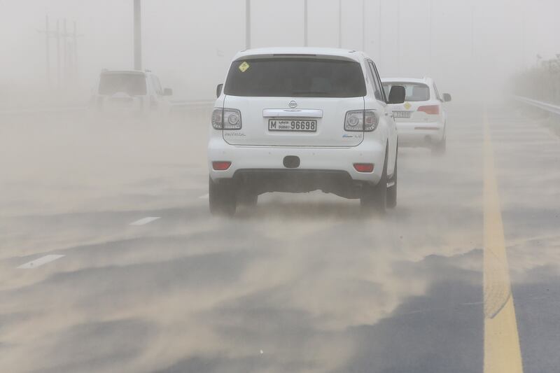 

DUBAI , UNITED ARAB EMIRATES – March 20 , 2017 : Traffic during the dust storm on Al Qudra road in Dubai. ( Pawan Singh / The National ) For News / Online *** Local Caption ***  PS2003- WEATHER03.jpg