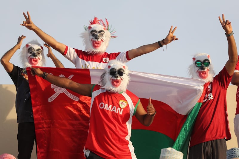 Oman football supporters wait for the start of the 2019 AFC Asian Cup group F football match between Uzbekistan and Oman at Sharjah stadium in Sharjah.  AFP