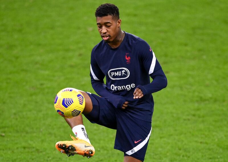 Presnel Kimpembe takes part in a training session at the Stade de France ahead of the Uefa Nations League match between France and Sweden. AFP