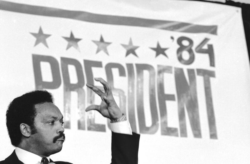 Jesse Jackson addresses supporters in Washington, on Nov 3, 1983, after he announced he would seek the Democratic presidential nomination. AP