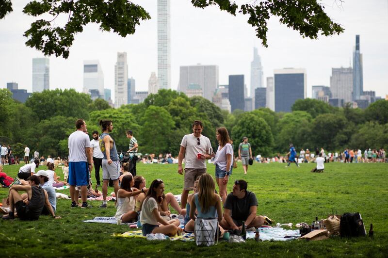 People gather in Central Park in New York, US on May 22. After 16 months, New Yorkers can now enjoy a city where most restrictions have been lifted. AFP