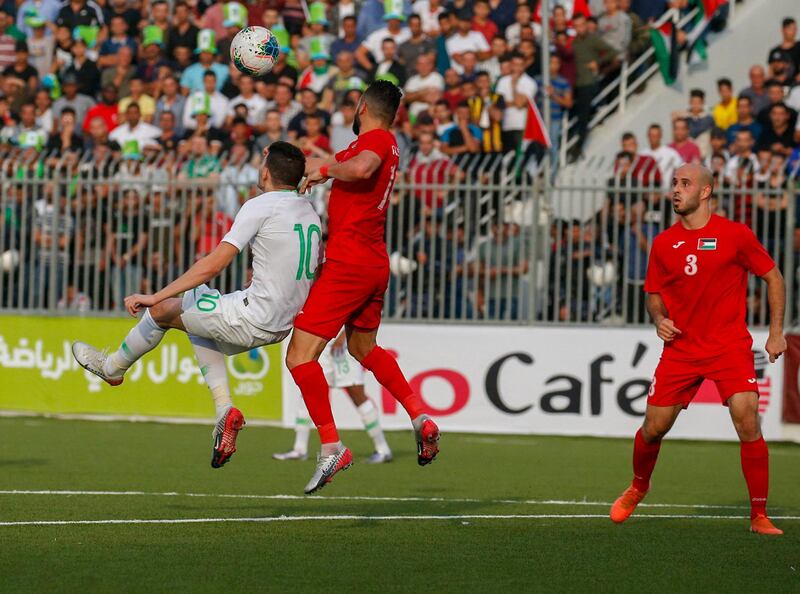 Saudi's forward Abdullah al-Hamdan (L) vies for the ball with Palestine's defender Abdallah Jaber (C) during the World Cup 2022 Asian qualifying match between Palestine and Saudi Arabia in the town of al-Ram in the Israeli occupied West Bank. The game would mark a change in policy for Saudi Arabia, which has previously played matches against Palestine in third countries. Arab clubs and national teams have historically refused to play in the West Bank, where the Palestinian national team plays, as it required them to apply for Israeli entry permits.  AFP