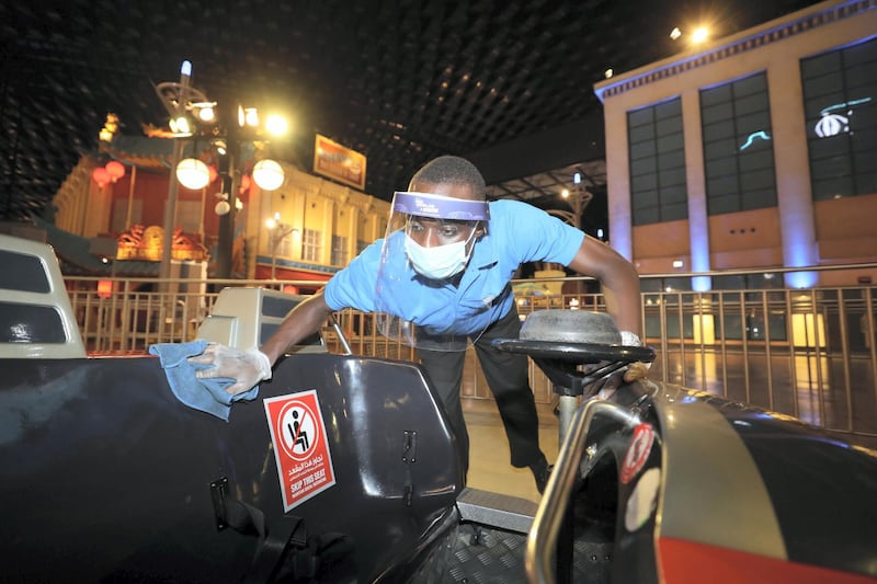 Dubai, United Arab Emirates - Reporter: N/A. Covid-19/Coronavirus. Kelvin cleans the Flight of the Quinjets ride after people have been on it. IMG World of Adventure opened on recently to the public with strict Covid-19/Coronavirus safety measures. Tuesday, July 21st, 2020. Dubai. Chris Whiteoak / The National