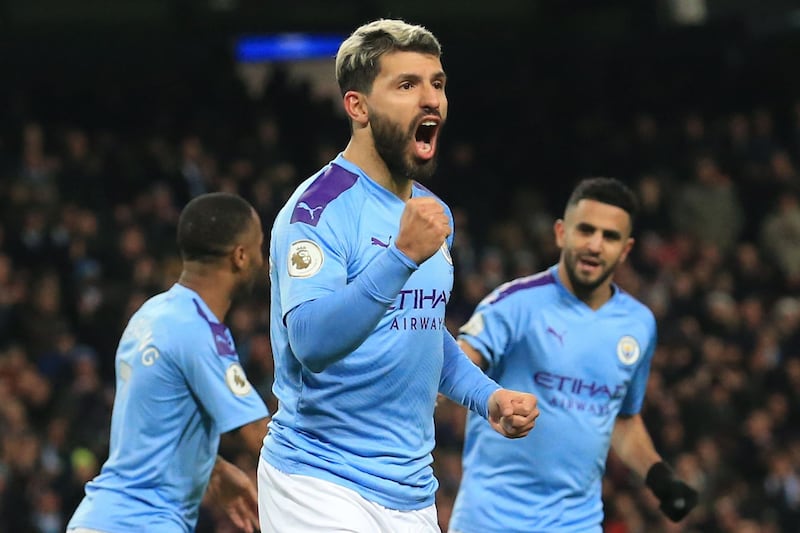 Manchester City's Argentinian striker Sergio Aguero (C) celebrates scoring the opening goal during the English Premier League football match between Manchester City and Sheffield United at the Etihad Stadium in Manchester, north west England, on December 29, 2019. RESTRICTED TO EDITORIAL USE. No use with unauthorized audio, video, data, fixture lists, club/league logos or 'live' services. Online in-match use limited to 120 images. An additional 40 images may be used in extra time. No video emulation. Social media in-match use limited to 120 images. An additional 40 images may be used in extra time. No use in betting publications, games or single club/league/player publications.
 / AFP / Lindsey Parnaby / RESTRICTED TO EDITORIAL USE. No use with unauthorized audio, video, data, fixture lists, club/league logos or 'live' services. Online in-match use limited to 120 images. An additional 40 images may be used in extra time. No video emulation. Social media in-match use limited to 120 images. An additional 40 images may be used in extra time. No use in betting publications, games or single club/league/player publications.
