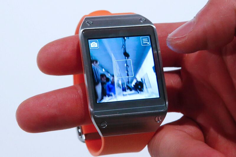 A Samsung Galaxy Gear smartwatch is pictured after its launch during an event at the IFA consumer electronics fair in Berlin, September 4, 2013. Samsung Electronics Co Ltd unveiled a smartwatch on Wednesday that works as an accessory to its market-leading Galaxy smartphones, with a small screen offering basic functions like photos, hands-free calls and instant messaging. REUTERS/Fabrizio Bensch (GERMANY  - Tags: BUSINESS TELECOMS SCIENCE TECHNOLOGY)