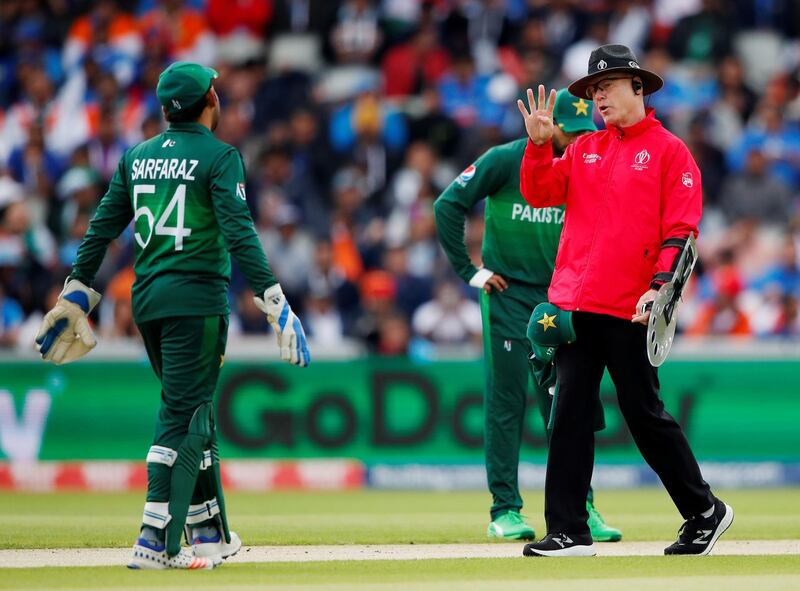 The Umpire talks to Pakistan's Sarfaraz Ahmed. Reuters