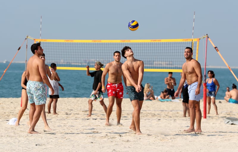 A game of volleyball at Kite Beach. Pawan Singh / The National