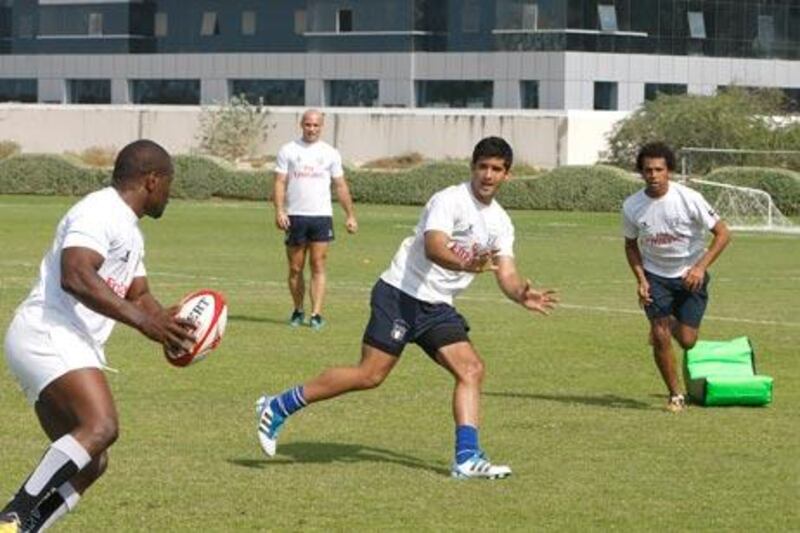From left, Dave Matasio, Stephane Imbert, Cyrus Homayoun and Mohammed Hassan Rahma prepare for the sevens tournament.