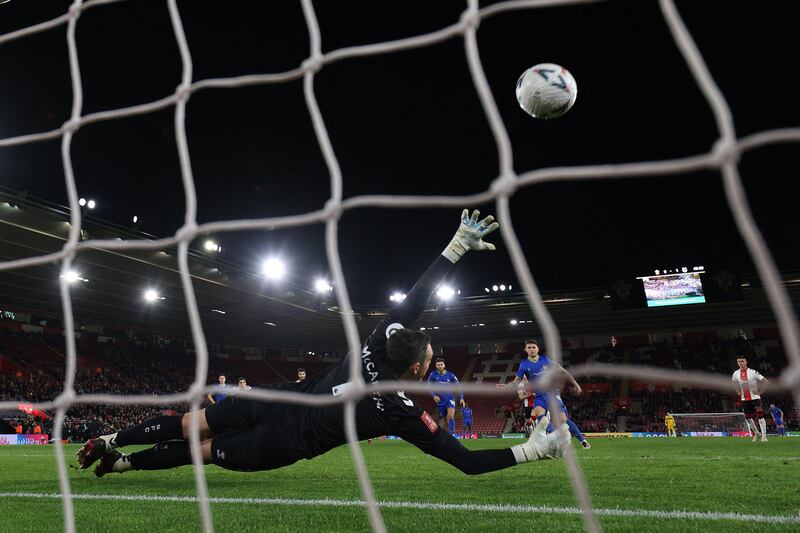 Grimsby's Irish midfielder Gavan Holohan scores his second goal from the penalty spot during the English FA Cup fifth round match against Southampton at St Mary's Stadium in Southampton. AFP