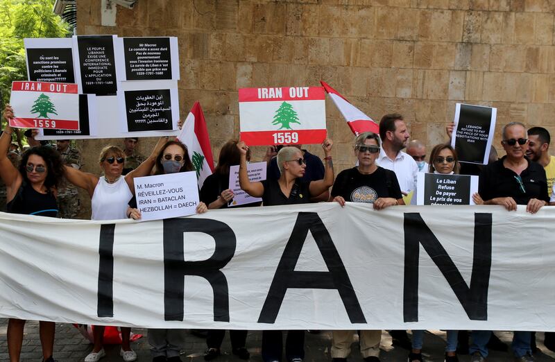 Anti-government protesters during a demonstration outside the French embassy in Beirut, Lebanon. EPA