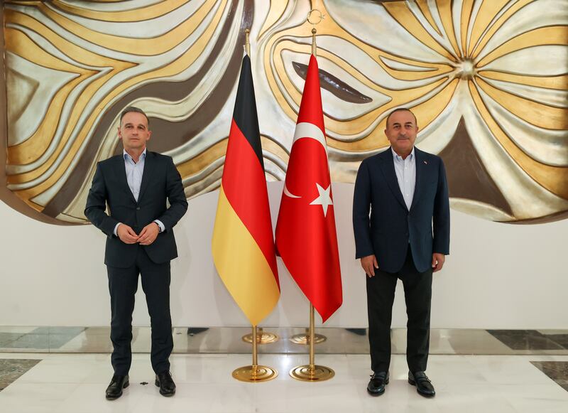 German Foreign Minister Heiko Maas meets his Turkish counterpart, Mevlut Cavusoglu, in Antalya on Sunday. Photo: Turkish Foreign Ministry via Reuters