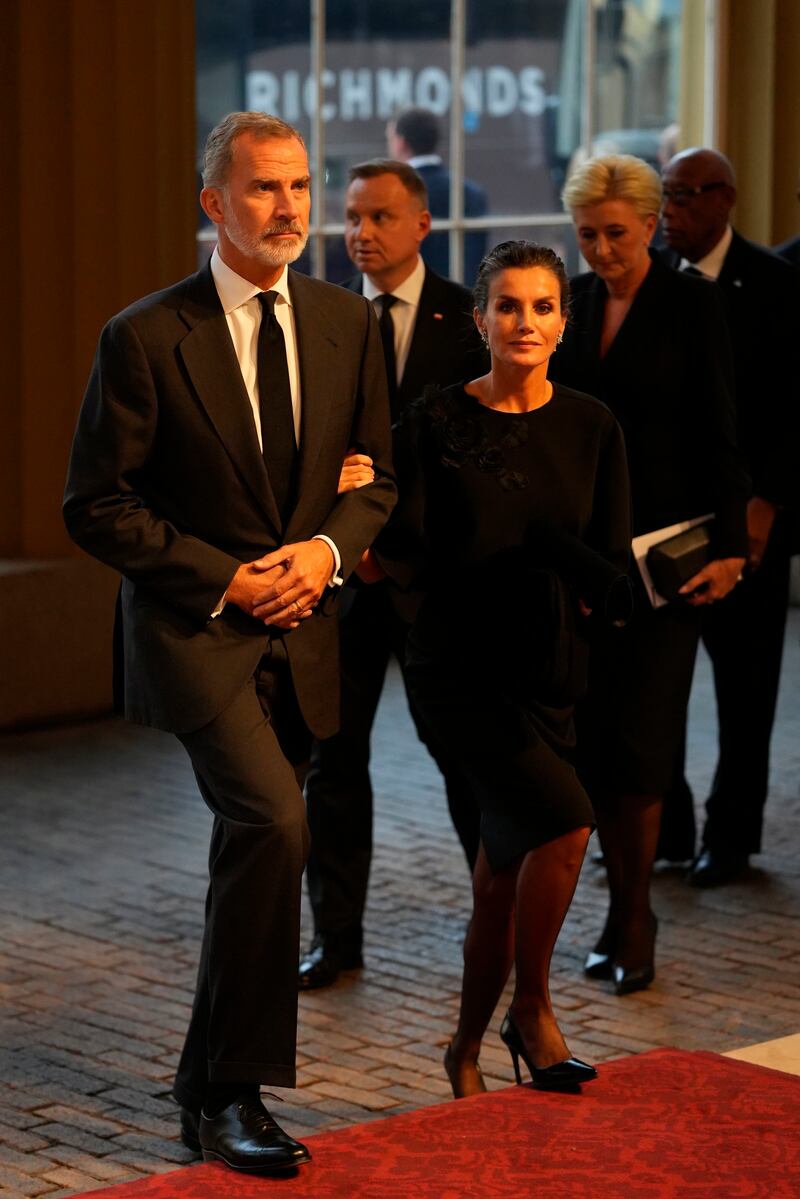 Spain's King Felipe VI and Queen Letizia arrive at the palace. AP