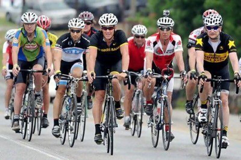 After retiring for a second time in 2011, Lance Armstrong, centre, in black, still occasionally rode in small events or charity rides such as this one in Pleasant Grove, Ala., on April 27, 2012.