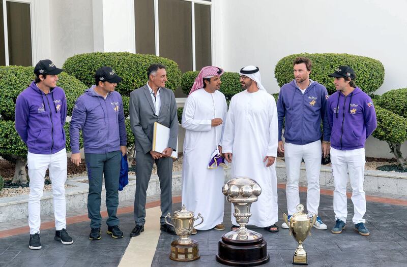 ABU DHABI, UNITED ARAB EMIRATES - February 05, 2018: HH Sheikh Mohamed bin Zayed Al Nahyan Crown Prince of Abu Dhabi Deputy Supreme Commander of the UAE Armed Forces (3rd R), stands for a photograph with members of the Abu Dhabi Polo team, the winners of the HH President of UAE Polo Cup 2018 tournament, during a Sea Palace barza. 

( Rashed Al Mansoori / Crown Prince Court - Abu Dhabi )
---