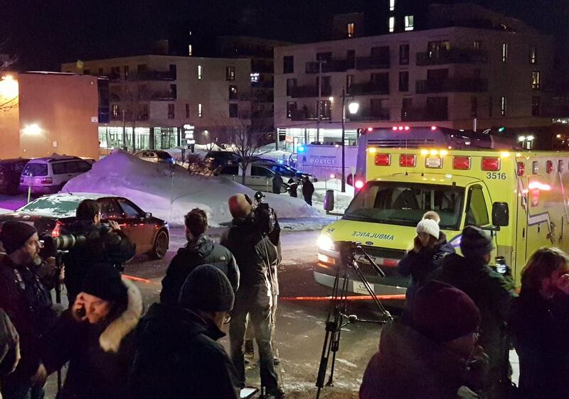 An ambulance is parked at the scene of a fatal shooting at the Quebec Islamic Cultural Centre in Quebec City, Canada on January 29, 2017. Mathieu Belanger / Reuters