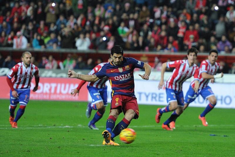 Luis Suarez of FC Barcelona shoots a penalty kick during the La Liga match between Sporting Gijon and FC Barcelona at Estadio El Molinon on February 17, 2016 in Gijon, Spain. Suarez failed to score from the kick. (Photo by Denis Doyle/Getty Images)