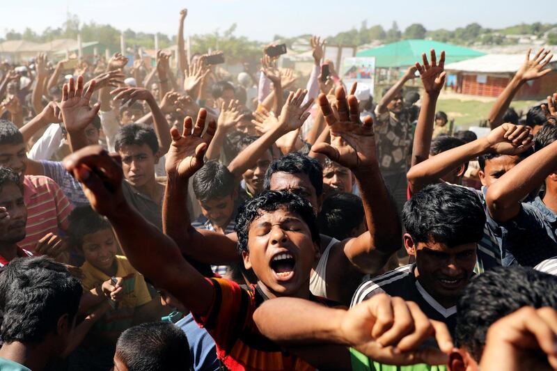 Hundreds of Rohingya refugees shout slogans as they protest against their repatriation at the Unchiprang camp in Teknaf, Bangladesh. Reuters