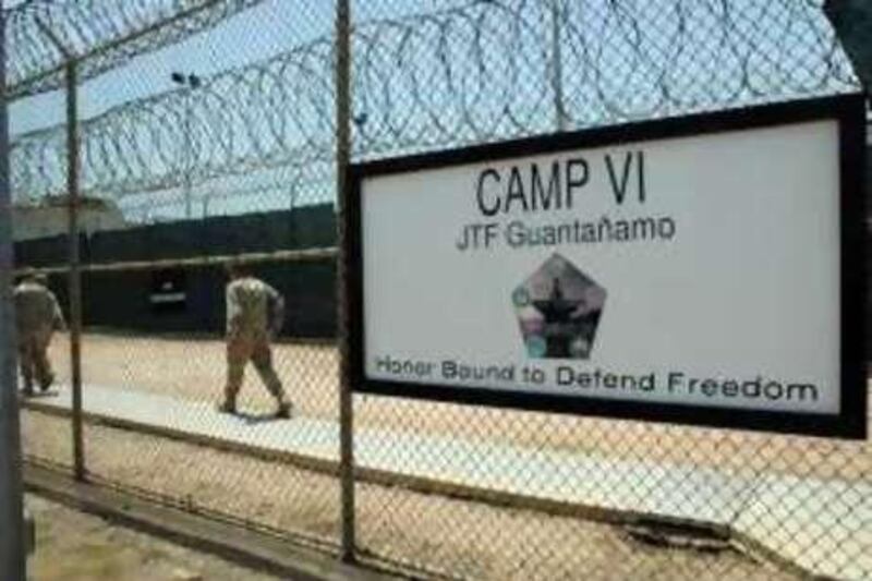 23 Jul 2008, Guantanamo Bay, Cuba --- In this image reviewed by the US Military, a sign marks one of the entrances to the detention center, at Guantanamo Bay US Naval Base, in Cuba. --- Image by © Randall Mikkelsen/ Pool/epa/Corbis