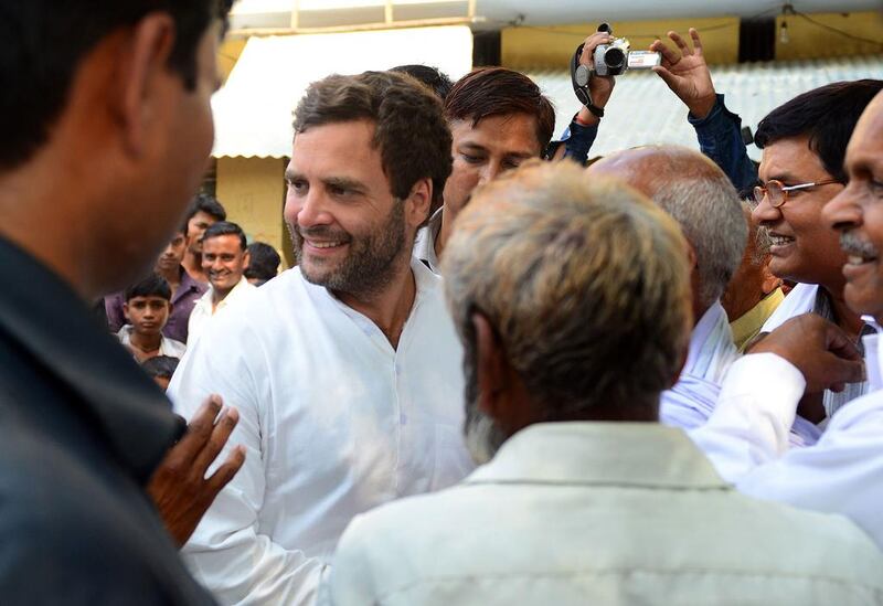 Rahul Gandhi visits a polling station during voting in Amethi on May 7, 2014. The Congress party leader is seeking election for a third time from the parliamentary constituency that has always backed his family. Sanjay Kanojia / AFP