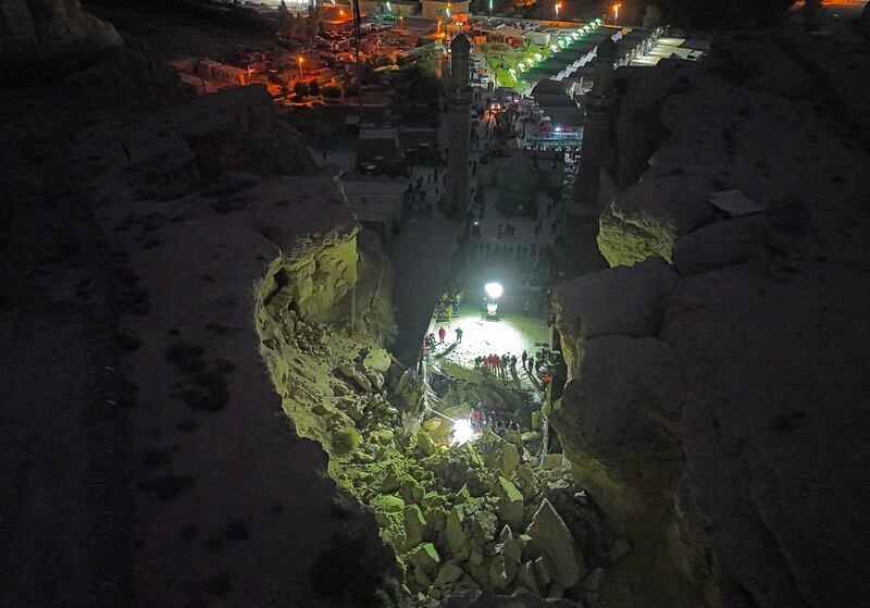 Civil defence spokesman Nawas Shaker said sand and rocks hit the roof of the shrine, which then collapsed on top of visitors. AFP