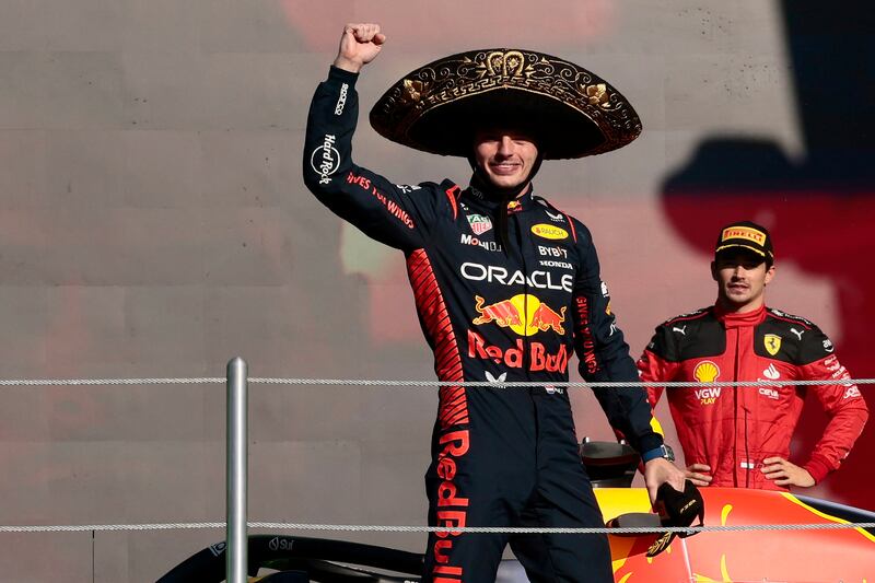 Max Verstappen celebrates his record-setting 16th victory of the season at the Mexican Grand Prix. EPA