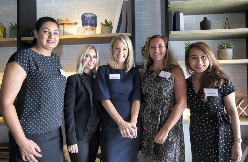 DUBAI, UNITED ARAB EMIRATES - Louise Karim with her team at the Mums work fair at Onyx Tower.  Leslie Pableo for The National for Patrick Ryan's story