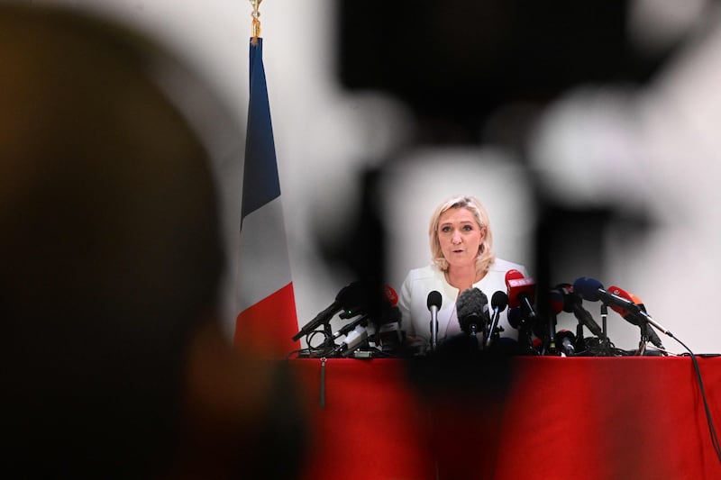 Ms Le Pen holds a press conference on diplomacy and foreign policy in Paris. AFP