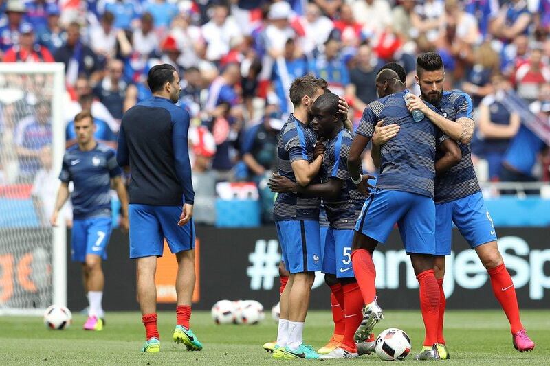 France players warm up ahead the Euro 2016 round of 16 football match between France and Republic of Ireland. Valery Hache / AFP