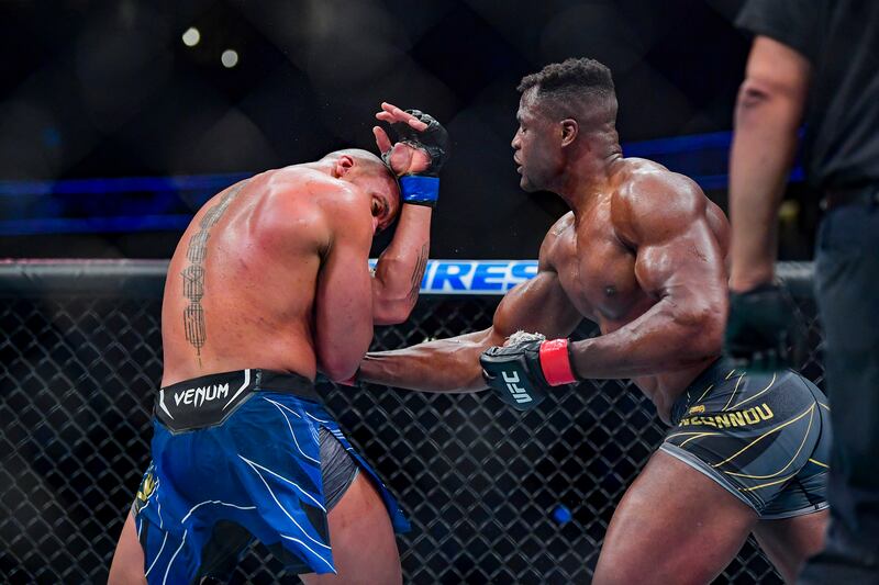 Francis Ngannou lands a body shot on Ciryl Gane during their heavyweight title bout at UFC 270. USA TODAY Sports