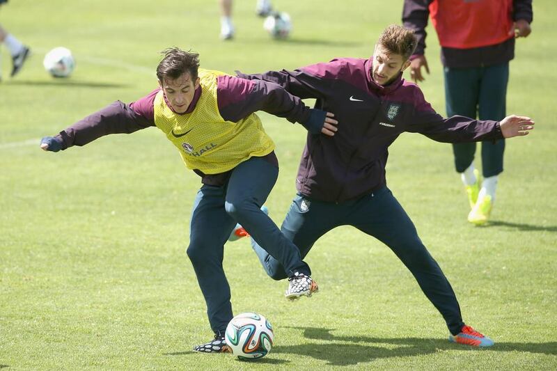 Leighton Baines and Adam Lallana in action during England's training session for the 2014 World Cup on Wednesday in Portugal. Richard Heathcote / Getty Images / May 21, 2014