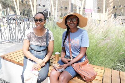 Judy Munene (right) and her sister Elizabeth are hoping to see some of the pavilions they did not get a chance to visit. Pawan Singh / The National