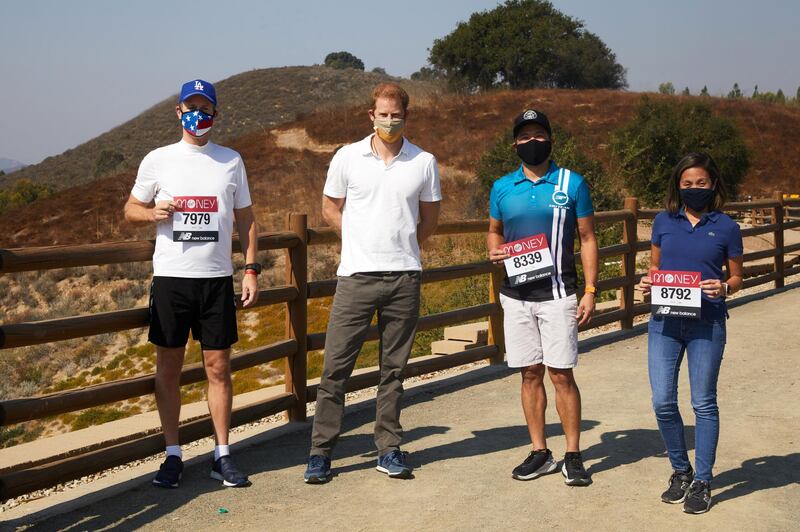 LONDON, ENGLAND - OCTOBER 04: (FREE FOR EDITORIAL USE ON BEHALF OF LONDON MARATHON.) Prince Harry, Duke of Sussex (second from left) shows his support for the 2020 Virgin Money London Marathon from Los Angeles on October 03, 2020 in Los Angeles, United States. The 40th Race will take place on a closed-loop circuit around St James‚Äôs Park in central London.  (Photo by Pool/Getty Images)