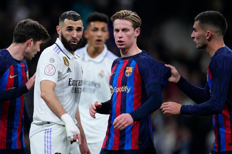 Frenkie de Jong 7 - Early tussle with Vinicius saw the Madrid player booked. Valverde was also booked for a foul on the Dutchman, but it was Barça’s fighting display – without key players – which won the game. Always excellent on the ball. AP Photo