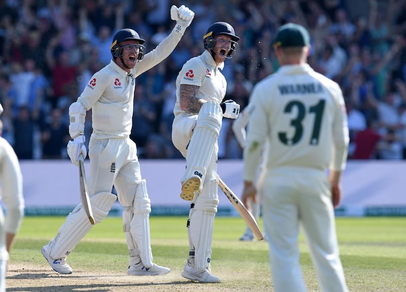 England's Ben Stokes (L) and England's Jack Leach celebrates after winning on the fourth day of the third Ashes cricket Test match between England and Australia at Headingley in Leeds, northern England, on August 25, 2019. England beat Australia by one wicket to win epic third Test. - RESTRICTED TO EDITORIAL USE. NO ASSOCIATION WITH DIRECT COMPETITOR OF SPONSOR, PARTNER, OR SUPPLIER OF THE ECB
 / AFP / Paul ELLIS / RESTRICTED TO EDITORIAL USE. NO ASSOCIATION WITH DIRECT COMPETITOR OF SPONSOR, PARTNER, OR SUPPLIER OF THE ECB
