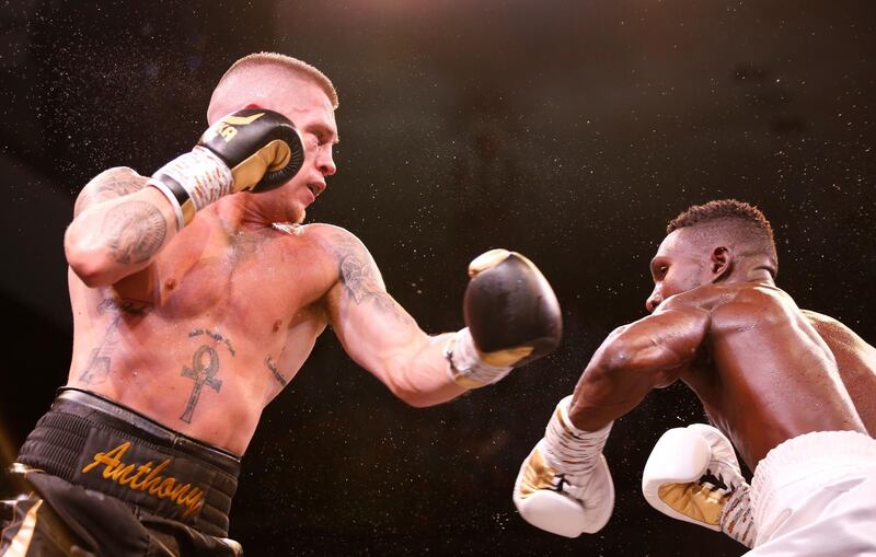 Anthony de Bruijn and Emmanuel Noi Mensah in action during their Universal Boxing Organization (UBO) Inter-Continental Lightweight title fight in Dubai. EPA