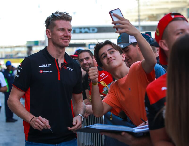 Nico Hulkenberg of Haas with fans at the Yas Marina Circuit