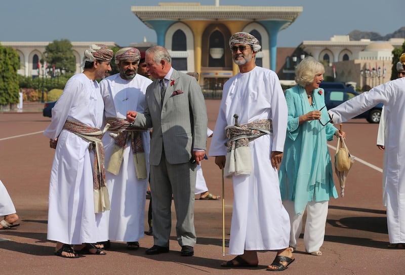 Sayyid Haitham bin Tariq Al Said, center right, is seen next to Britain's Prince Charles while welcoming him and his wife, Camilla, Duchess of Cornwall, at Bait Al Noor church in Muscat. AP Photo