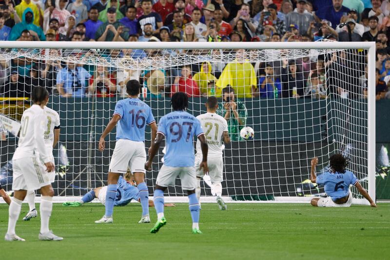 Erling Haaland scores a goal during the friendly match between Manchester City and Bayern Munich. AFP