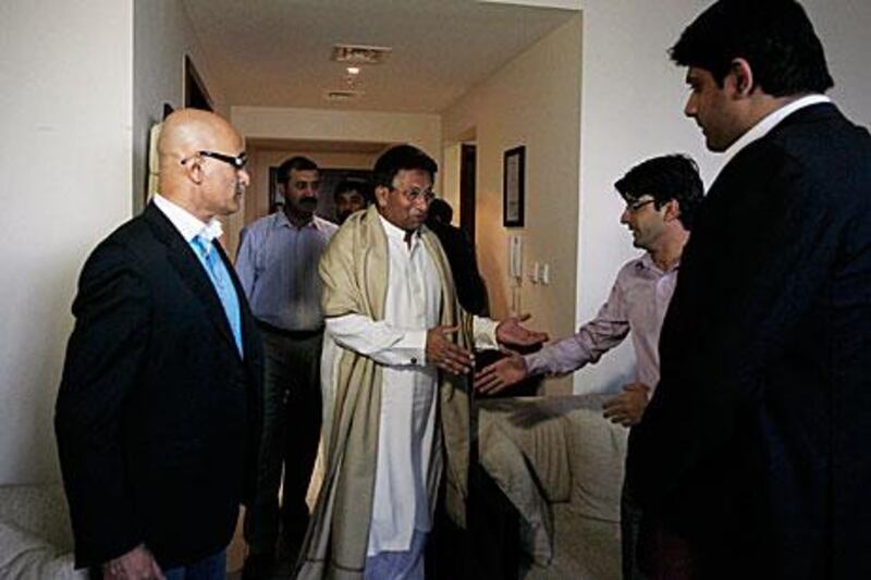 Former Pakistani president Pervez Musharraf arrives ahead of his speech, broadcasted in Dubai, announcing that he will return to the country and prepare for elections.