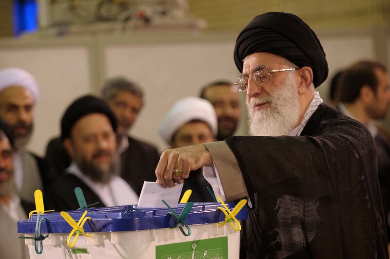 Iran's Supreme Leader Ayatollah Ali Khamenei casts his vote to elect a new president in his office in Tehran in 2009. AFP