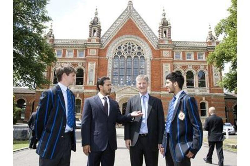Sheikh Sultan bin Tahnoon Al Nahyan (second from left) with Dulwich College's retiring master, Graham Able, during a recent visit to the London school to sign a memorandum of understanding.