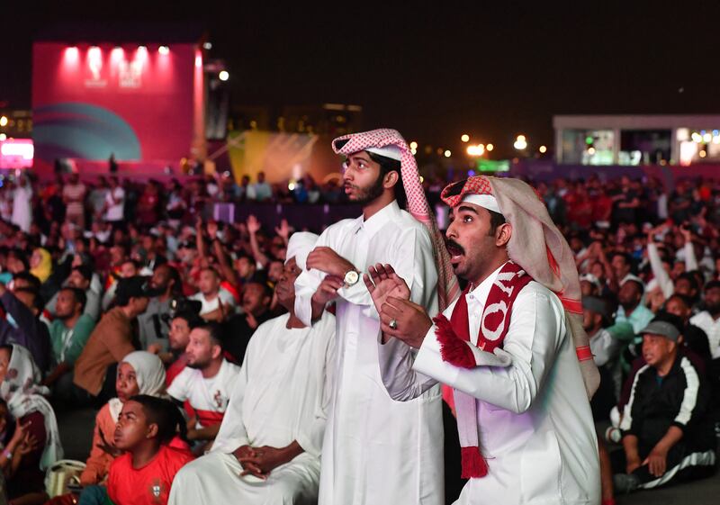 The fan zone at Al Bidda Park, Doha, was packed with fans from around the world as Qatar played Senegal. Reuters