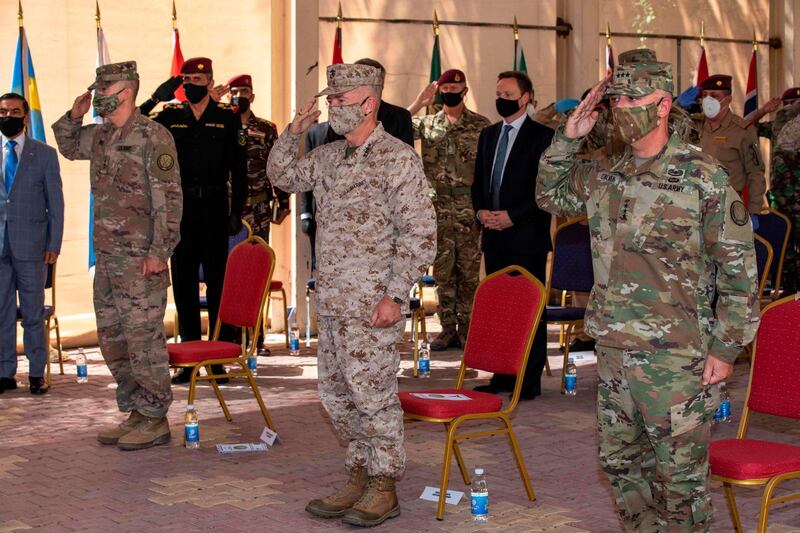 This US Department of Defense photo shows combined Joint Task Force-Operation Inherent Resolve, the military organization to defeat Daesh in Iraq and Syria, swapping leaders during a change of command ceremony in Baghdad, on September 9, 2020, as Lt. Gen. Paul Calvert (R), Gen. Kenneth F. McKenzie Jr. (C), commanding general, US Central Command, and Lt. Gen. Pat White (L, III Armored Corps commanding general, salute during a ceremony to welcome Gen. Calvert as the new CJTF-OIR commander. RESTRICTED TO EDITORIAL USE - MANDATORY CREDIT "AFP PHOTO /DOD/ISAIH VEGA/HANDOUT " - NO MARKETING - NO ADVERTISING CAMPAIGNS - DISTRIBUTED AS A SERVICE TO CLIENTS
 / AFP / DoD / Isaih VEGA / RESTRICTED TO EDITORIAL USE - MANDATORY CREDIT "AFP PHOTO /DOD/ISAIH VEGA/HANDOUT " - NO MARKETING - NO ADVERTISING CAMPAIGNS - DISTRIBUTED AS A SERVICE TO CLIENTS
