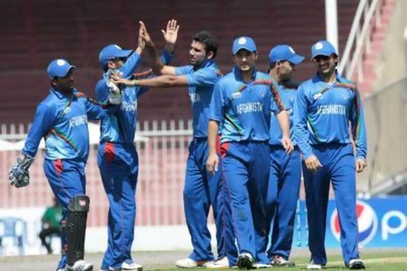 The Afghanistan bowlers restricted Scotland to 199 for eight in their 50 overs at Sharjah Cricket Stadium. Jeffrey E Biteng / The National