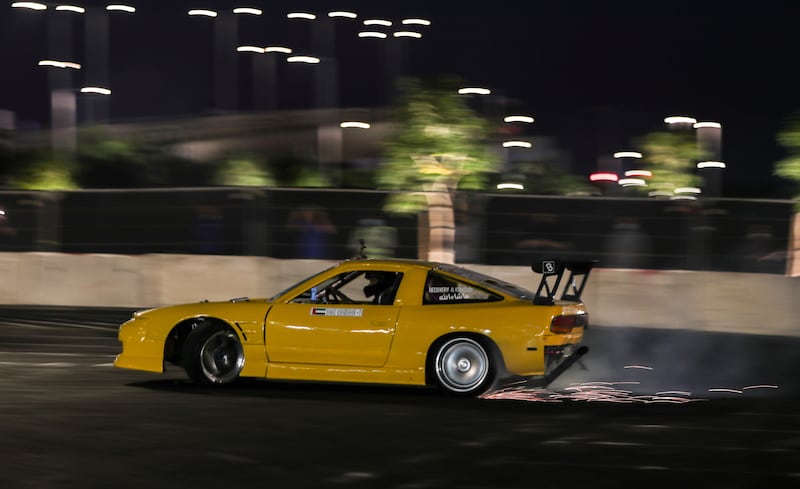 A driver shows off his drifting skills at the turbo-charged motor show. EPA