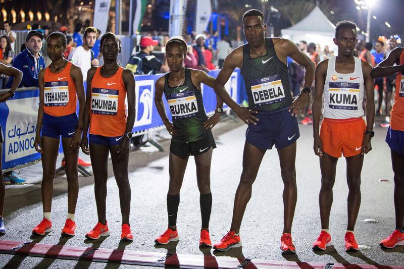 ABU DHABI, UNITED ARAB EMIRATES- Participants warming up before the race at the ADNOC ABU Abu Dhabi Marathon.  Leslie Pableo for The National 