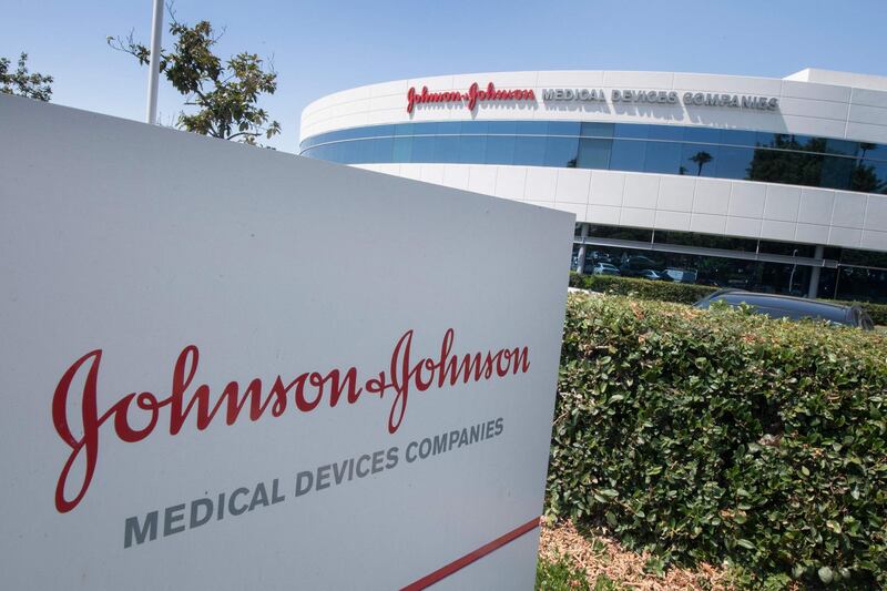 (FILES) In this file photo taken on August 28, 2019 the entry sign to the Johnson & Johnson campus shows their logo in Irvine, California. The European Medicines Agency said on March 9, 2021 that it is set to decide whether to authorise Johnson & Johnson's Janssen single-shot coronavirus vaccine for the EU on March 11. If approved by the Amsterdam-based regulator, the vaccine would be the fourth to get the green light for the 27-nation bloc, in a boost for its slow-starting vaccination programme.
 / AFP / Mark RALSTON
