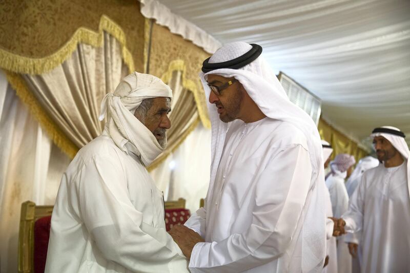 FUJAIRAH, UNITED ARAB EMIRATES - August 13, 2017: HH Sheikh Mohamed bin Zayed Al Nahyan, Crown Prince of Abu Dhabi and Deputy Supreme Commander of the UAE Armed Forces (R), offers condolences to the Rashed Al Hassani (L), the father of the martyr Mohamed Rashed Al Hassani, who passed away while serving with the UAE Armed Forces in Yemen.

( Mohamed Al Hammadi / Crown Prince Court - Abu Dhabi )
---