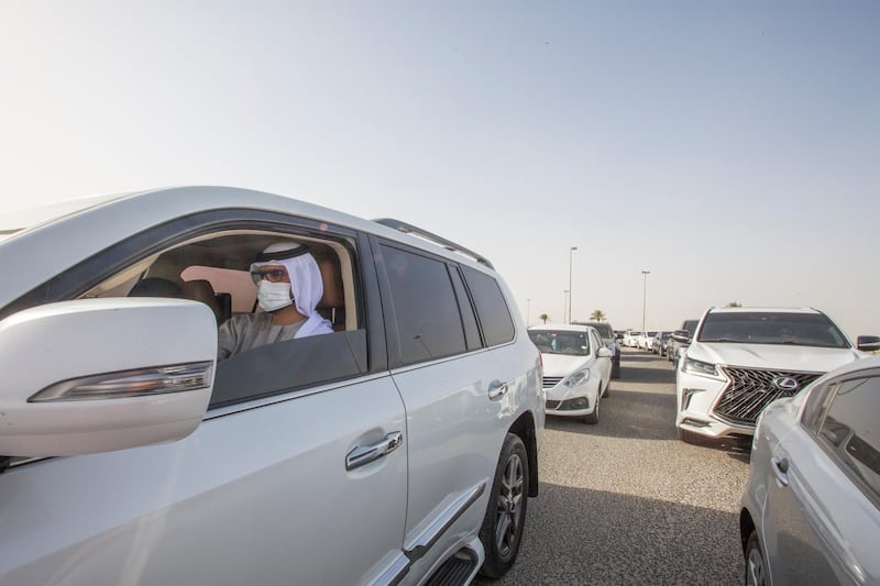 Dubai, United Arab Emirates - Cars queue at the new  DPI Testing Centres border of Dubai and Abu Dhabi.  Leslie Pableo for The National for Shireena Al Nowais story