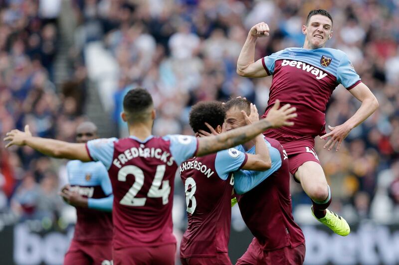 Andriy Yarmolenko of West Ham United celebrates with teammates Felipe Anderson and Declan Rice  after scoring. Getty Images